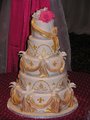 06 Fleur-de-Lis-Gold-White-Swagged-Wedding-Cake